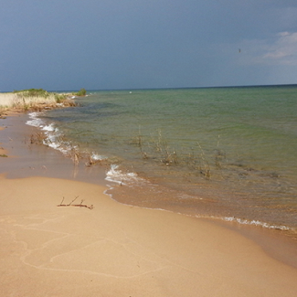 The Lake Huron shoreline at Tawas Point, Michigan. This area is part of the Great Lakes Coastal Wetlands Resilient Lands and Water Partnership.