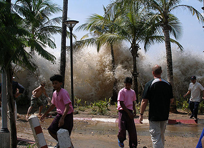 The tsunami crashing on shore at Ao Nang, Thailand.