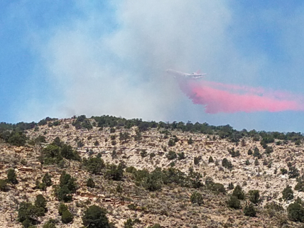 June, 2020: Fire retardant is dropped from an airplane to help slow the spread of the Mangum Fire in Arizona’s Kaibab National Forest. This human-caused fire burned 71,450 acres and was the third-largest fire in Arizona that year. Ninety percent of wildfires are human-caused.